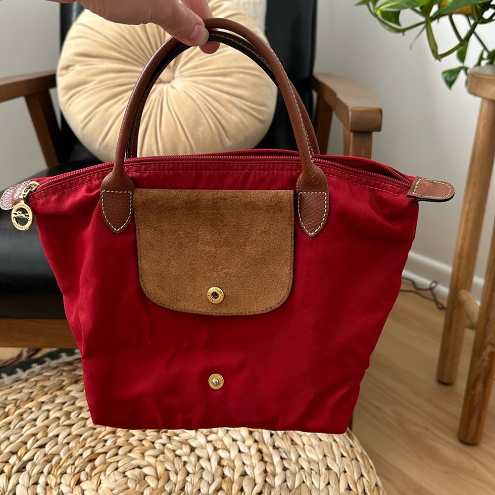 Red “Mini le pliage” Longchamp handbag